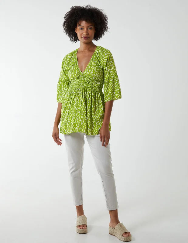 lime-shirred-bust-top